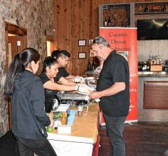 <b>Those attending the eighth annual Taste of Vernon on April 28 sampled food and desserts from 11 vendors. (Photos by Maria Kovic)</b>