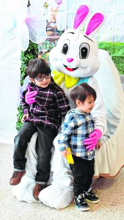 <b>Tristan and Everett Moya of Vernon pose with the Easter Bunny.</b>