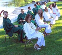 Graduates with Salutatorian Sierra Hartlieb (front row, second from left) (Photo by Vera Olinski)
