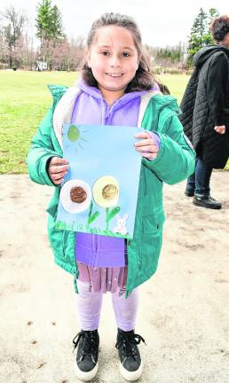 <b>Ellie Chapman of WAntage is shown holding her spring craft.</b>
