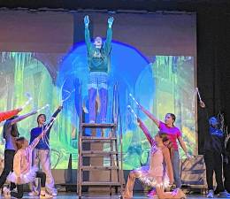 <b>Lillian Aragona, on stairs, plays Elsa in ‘Frozen Jr.’ this week at Sussex Middle School. With her, from left, are Alana Rochel, Carly VanderWalk, Zoey Cosh, Arabella Coursen-Budd, Hannah Gigintino and Z’lagi Sampson. </b>(Photos provided)