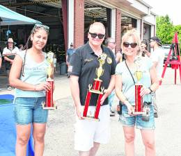 <b>Meg Wahnon, Vernon Mayor Antony Rossi and Michelle Downtain, all of Vernon hold their trophies.</b>