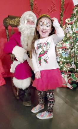 Aubree was super happy to see Santa and could not wait to talk to him.