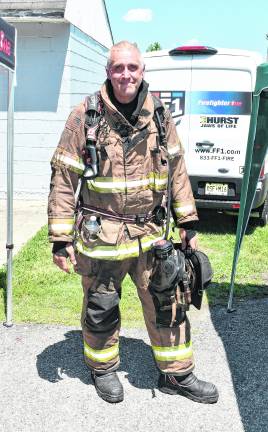 Fire instructor John Buskiewicz poses for a photo.