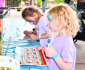 <b>Katherine and Kennedy Kelly of Vernon draw.</b>