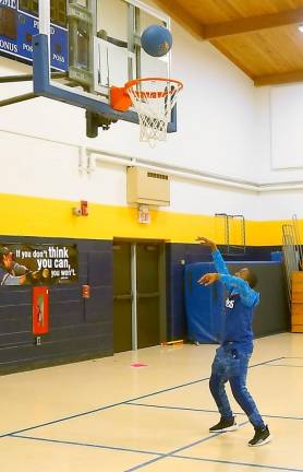 Students shoot hoops at the Glen Meadow Middle School Game Night.