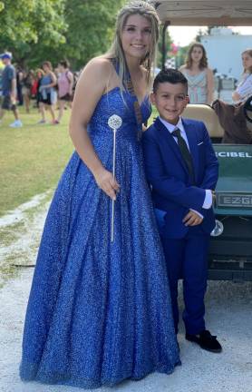 Jacob Lopez is shown with Queen of the Fair Lucy Colvin.