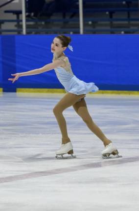 Harper Schmid placed 12th of 24 girls in her first appearance in the Eastern Sectional Singles Final ice skating competition.