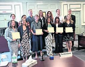 <b>From left, front, Suzanne Bellofatto, Caryn Mandel, Blair Pack, Katherine Perez, Maura Smith, Mary de Poortere; back, Amineh Al-Aydi, Ruchi Naik, Mark Vineis, Ann Johnson, Genna Preson, Eric Hess, Kenneth Gaby-Biegel. </b>
