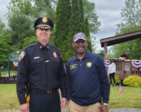 Vernon Township Police Chief Dan Young, left, stands with Mayor Howard Burrell