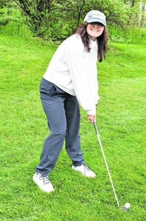 Keegan Pepe of Hampton prepares for her next shot.