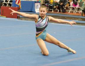 Westys gymnast Samie Copley performs during a floor routine.