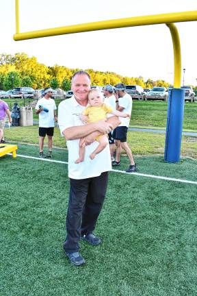 <b>Vernon Mayor Anthony Rossi holds his grandson.</b>