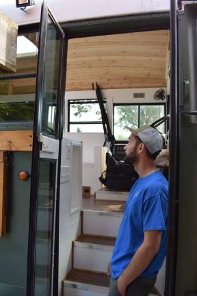 Photo by Erika Norton Michael Feuhrer stands inside the doorway of his future home.