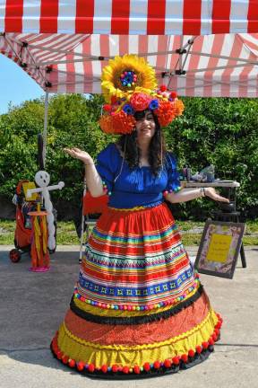 <b>Kerry Tobin of Highland Lakes is dressed as Pixie Pop the Clown.</b>