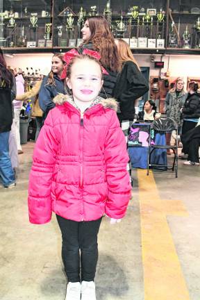 <b>Charlotte Jasinski of Vernon poses at the tree lighting.</b>