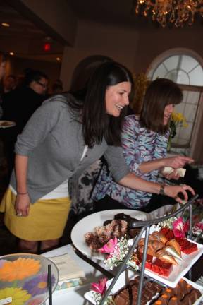 Valerie McKenna of Sparta happy to sample chocolates provided by The Chocolate Goat in Lafayette.