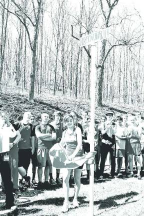 Photos by Kevin Fenlon Sarah Disanza unveils the trail named in her honor.