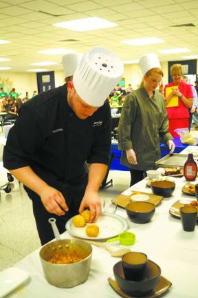 Photos by Chris Wyman Winning team leader Chef Christian Cortes, an employee at Sodexo's Hillsboro School District facilities.