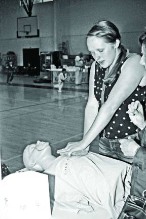 Jodi Bischoff, 18, a senior at Vernon Township High School answered questions about CPR and gave demonstrations to those who had questions. She plans to initially attend Rutgers and then pursue a career in medicine with the intention of becoming a medical doctor.