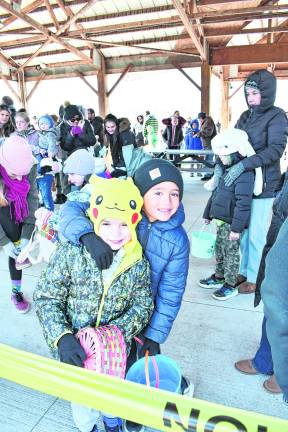 <b>Grayson Flett and Matthew Cerutti, both of Wantage, get ready to hunt Easter eggs.</b>