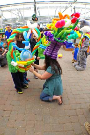 First place winners in the bonnet contest were the Balloon Hat People from Highland Lakes Sebastian Tobin, 2, for best child's bonnet and his mom Terry for best adult&#xed;s bonnet. Older brother Ozzie, 8, placed somewhere after first. Heaven Hill holds bonnet contest and free 12,000 Easter egg hunt