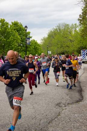 More than 70 people took part in the Vernon PAL's annual 5K on Sunday morning, May 21 in Maple Grove Park. (Photos by Aja Brandt)