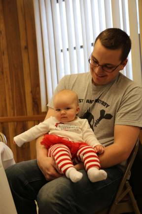 Jordan and six month old Aaliyah Ellefsen of Wantage came all decked out to the Beemerville FD Christmas party.