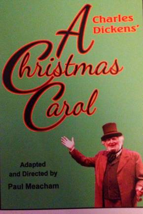 The program cover of 'A Christmas Carol' featuring Paul Meacham as not only the director and writer but as Ebenezer Scrooge (shown here).