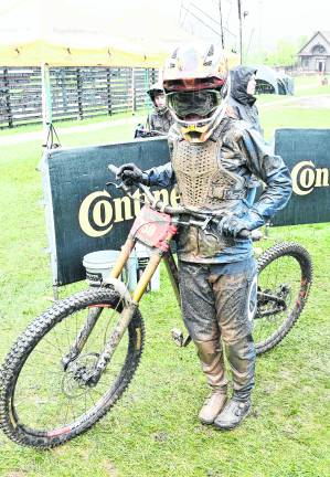 <b>Hanah Forsman poses next to her bike.</b>
