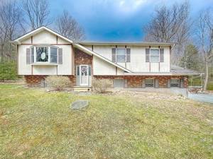 Raised ranch on 3-plus acres is move-in ready with lots of upgrades