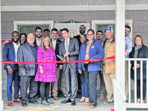 Christopher Gaeta, chief executive of InSite Health, cuts the ribbon at its grand opening March 15 in Andover Township. (Photo provided)