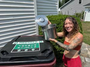Samantha Redonda with a warped stainless steel pot. (Photo by Brenda Hughes)