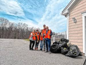 <b>Residents of Clove Hill Manor in Wantage collected 11 bags of trash during a community cleanup March 29. Supplies were provided by Clean Communities. (Photo provided)</b>