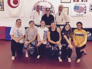 Pictured in front, from left: Emily Doumanis, Tori Waschek, Olivia Speight, Hailey Minter, Emma Cahill, Alysia Arocho. Back row: Sensei Tom Shull, Sensei Monica McGovern, Sensei Paul Doumanis