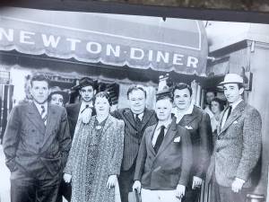 Babe Ruth, second from right, poses with others in front of the Newton Diner in the early 1940s. At left is Russ Van Atta, Ruth’s teammate on the New York Yankees. (Photo taken by Adrien Salvas)