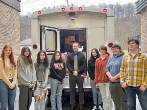 High Point Regional High School students, from left, Madison Tallamy, Cadence Strehl, Kendall Strehl, Isis Garrison, Sydney Holder, Fred Ogrinz, Benjamin Smith and Ed Muller pose with Principal Jonathan Tallamy, center. (Photo provided)