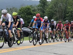 Participants in the Giro del Cielo bike race, organized by Skylands Cycling Club, ride past Frankford Park on Sunday morning, July 9. (Photo by Kathy Shwiff)