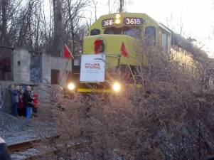 The Operation Toy Train pulls in to the delight of the amazed crowd.