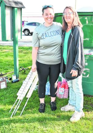 <b>Christine Gallo, left, and Liz Couser, both of Vernon, pose for a photo.</b>