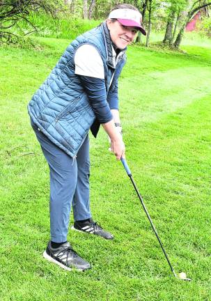 J.D. Verheek of Hampton prepares her next shot.