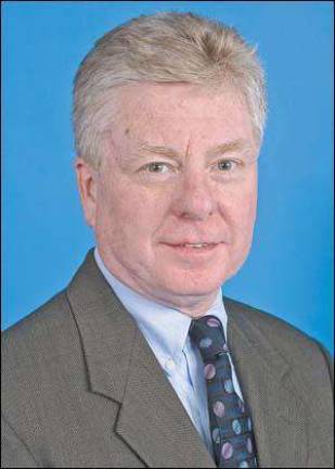 Roche honored for decades of service by speech-language-hearing group