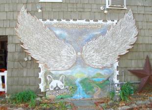 This mural can be viewed on the side wall of the Daily Bean Cafe entitled Wings of Vernon.