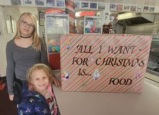 2023 Little Miss Wantage Calianna Guest and her sister Salacia Fortuin have organized a holiday food drive. (Photo provided)
