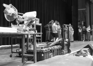 The cast and crew is involved in the construction of the set pieces for “Cinderella.” Photo credit: Matt Moment