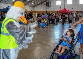 Sammy Seagull, the recycling mascot for the Sussex County Municipal Utilities Authority, greets Delilah Shone <b>during Sussex County Day on Sunday, Sept. 14. (Photos by Nancy Madacsi)</b>