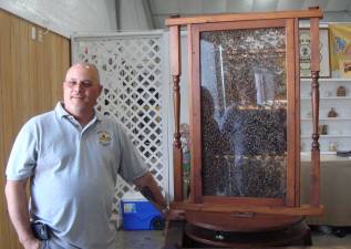 Beekeeper Jeff Larsen explains bee hives and the art of beekeeping.