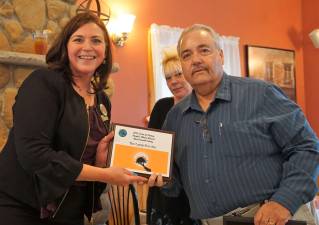 From right, Lamp Post Inn owner Sal Santonello receives the People's Choice Award Best Overall Eatery from Jennifer Hopper.