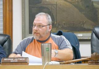 Mayor George Hutnick at an Ogdensburg Council meeting in January. The council adopted the 2020 budget via conference call on Monday.