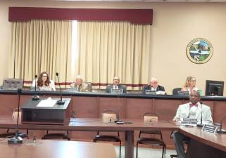 Vernon Mayor Howard Burrell and the rest of the Vernon Township Council debate a new ordinance.